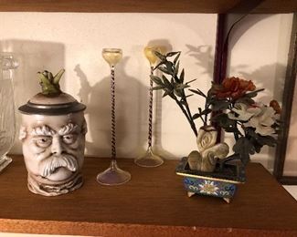 Otto von Bismarck “radish” stein by Musterschutz, art glass candlesticks by Jack Spivey, Chinese hardstone flower tree in cloisonné pot (8” tall)