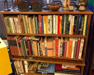 More books + knick knacks: cast iron bookends, wooden Don Quixote & more