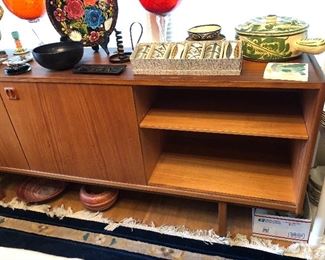 Detail of sideboard - has a sliding door at either end & 4 drawers at center (drawers are behind sliding door in this pic)