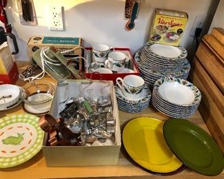 Set of Madero dishes (38 pieces), cookie cutters galore, vintage avocado green hand mixer w/ box, enamel plates