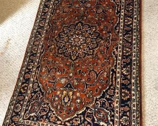 Newer hand woven 100% wool rug, made in India (35”x 65”)