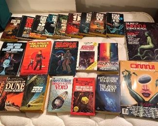 Dune books (Frank Herbert), Star Wars & Star Trek books, Omni sci fi magazines. NOTE: "Dune" 3rd from the left is gone - family kept it. All others available!
