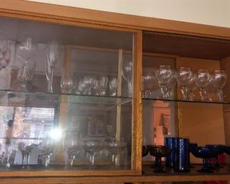 Assorted stemware, some blue Mexican glassware