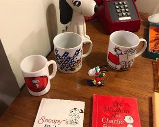 Vintage Snoopy items: mugs, books, ornament + fab red desk phone. There’s more Peanuts stuff too - books, posters, etc.