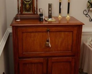 wine bar/cabinet, mantle clock, brass candlesticks, wine accessories 