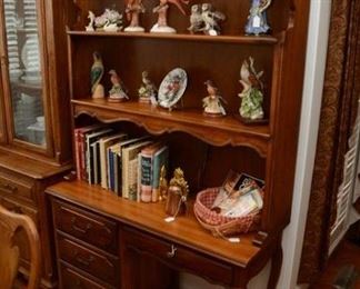 hutch/desk, bird figurines Andrea by Sadek, miscellaneous figurines, brass pineapple bookends, cook books 