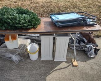Christmas wreathes, lawn chairs, cooler, plant holder stands/pedestals