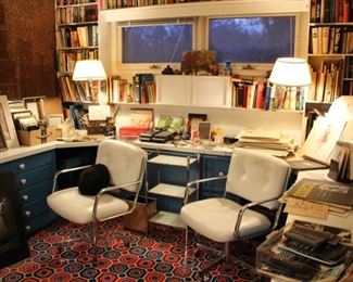 Vintage office - rolling chairs, books, artist sketches...