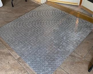 We have TWO heavy diamond plate steel ramps….one at the front door and one at the back door (the family owns an Industrial Pipe and Steel Company so these were custom made for them). 