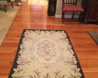 Vintage floral hand-hooked rug. 68” by 44”