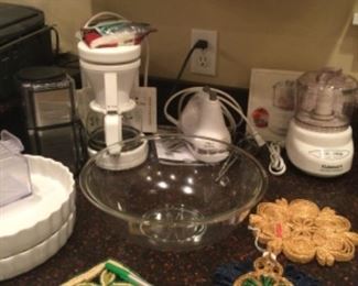 Kitchen Aid hand mixer, Cuisinart coffee grinder, Melita coffee pot, Cuisinart food chopper, Vegetti, tofu express.