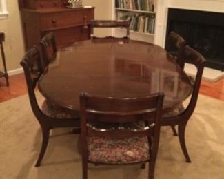 One captain’s chair and five mate chairs