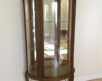 Antique Curved Glass Cabinet with Decorative Metal Scrollwork 