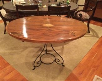 Oval inlaid table on metal frame