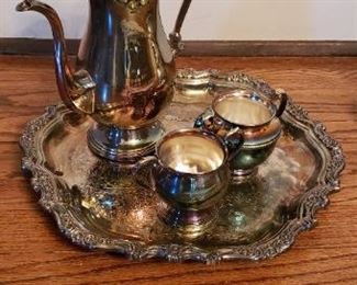 Multiple silverplate tea sets