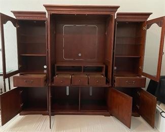 Lighted Entertainment Center Beautiful Mahogany Piece that Can be Separated to Create a Distinct Look, This Item is Located at the home in the Lakes and Still Available