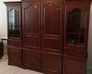 Lighted Entertainment Center Beautiful Mahogany Piece that Can be Separated to Create a Distinct Look, This Item is Located at the home in the Lakes and Still Available