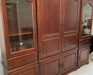 Lighted Entertainment Center Beautiful Mahogany Piece that Can be Separated to Create a Distinct Look, This Item is Located at the home in the Lakes and Still Available