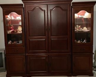 Lighted Entertainment Center Beautiful Mahogany Piece that Can be Separated to Create a Distinct Look, This Item is Located at the home in the Lakes and Still Available