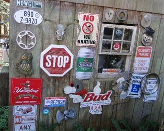 Many Advertising and street signs. They will all be in the garage, the barn had to be demolished