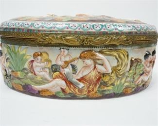 ANTIQUE 19TH C PORCELAIN CAPODIMONTE JEWELRY VANITY DRESSER BOX CASKET $406 plus shipping                                                                                  
 DETAILS:
Antique (1771 - 1834)
Porcelain Capodimonte 
Jewelry Box / Vanity Dresser Casket 
Hinged
Hand Painted 
Deep High-relief Cavorting Putties in Winery Theme Decorated the Box Throughout
Gold Gilding Accent Hinge and Clasp
Decorated Lining
Measurement: 10" L x 7.5" W x 4" H