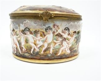 ANTIQUE 19TH C PORCELAIN CAPODIMONTE 5" TRINKET BOX CUPIDS AT PLAY IN WINERY $255        DETAILS:
Antique (1771 - 1834)
Porcelain Capodimonte 
Trinket Box
Hinged
Hand Painted 
Deep High-relief Cavorting Putties at Play in Winery 
Gold Gilding Accent Hinge and Shell Clasp
Measurement: 4 15/16" L x 3 3/4" W x 3 3/8" H
 
Condition:  2 hairlines that start at the top and end at the bottom.