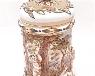 RARE ANTIQUE DOCCIA GINORI CAPODIMOTE PORCEAIN HIGH RELIEF PUTTI APOTHECARY JAR $600  plus shipping
 
 
DETAILS:
 High relief with famous putti design
circa - roughly 1880
porcelain & enamel
23cm including cover
N Crown Blue
 
Condition:  Wonderful condition.  One small chip to the inner side of the upper rim and a superficial chip at the outer rim of the cover. In the inner side of the cover through the body is an old star crack invisible from the outside unless viewed through a 10x magnifier.  