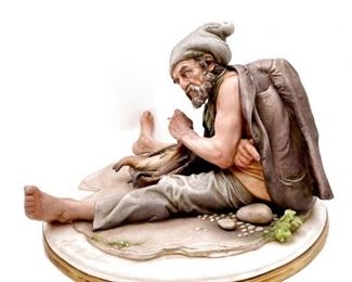 GIUSEPPE CAPPE GREAT NEOPOLITAN FISHERMAN CAPODIMONTE SIGNED PORCELAIN FIGURINE $799 plus shipping
 
 
This particular piece produced and signed in 1983. 
Signed
Giuseppe Cappe Capodimonte 
Neopolitan Piscatore with Basket of Fish
9" x 11" wide
Gold trimmed base