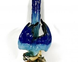 EXTREMELY LARGE HUTSCHENREUTHER GERMANY KUNSTABTEILUNG MACAW PARROT PORCELAIN $2556 plus shipping
 
This gorgeous and large porcelain sculpture from Hutschenreuther porcelain is of a a majestic blue-and-gold macaw, a neotropical parrot prized for its intelligence and striking colors, perched on a flowering branch, blue wings and tail outstretched.
 
The sculptor is Hans Achtziger and bears his signature on the bottom. Hans Achtziger was a designer and porcelain modeller who trained from 1937-1939 at the Staatlichen Fachschule für Porzellanindustrie in Selb, Bavaria. After 1946 he studied at the Bau-und Handwerker Schule in Munich before joining Hutschenreuther AG where he was director of the art department from 1961-64 before going on to head the form and decoration studio. He created dinner services and a large number of animal sculptures for the company.
 
Hutschenreuther porcelain is famous all over the world. Founded in 1814 by the family patriarch, Carolus Magnus Hutschenreuther, 