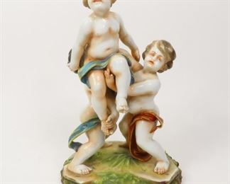 ANTIQUE ITALIAN CAPODIMONTE NAPLES LARGE CHERUB PUTTI GROUP PORCELAIN FIGURINE    $175 plus shipping
 
DETAILS:
Capodimonte Figurine
Three Cherubs
Circa 1860
Porcelain
Measurements: ~11" x ~7" x ~6"
Marked on Bottom 
 
Condition:  Antique.  No chips or cracks and appears to be in good overall condition. 