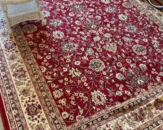 12’x9’ Oriental rug by Kashan Collection.