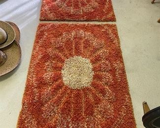 Pair of vintage sunburst rugs.