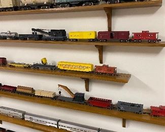 Large collection of model trains, including pre-war Lionel and American Flyer (A.C. Gilbert). More photos of accessories and boxes shown in photos that follow.