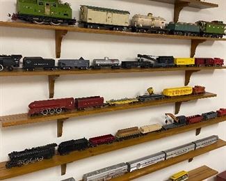 Large collection of model trains, including pre-war Lionel and American Flyer (A.C. Gilbert). Many more photos of trains, accessories and boxes shown in photos that follow.