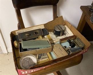 Vintage office supplies and door hardware.