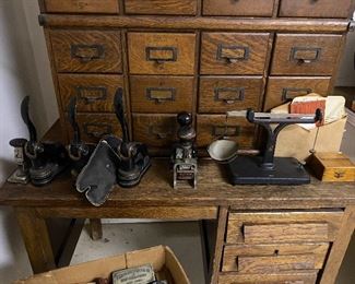 Antique cast iron stamp embossers and numbering machines; Brown & Sharpe precision scale with weights.