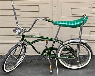 Schwinn #2. Vintage Stingray in Green with Banana Seat, Front Headlight, Chrome Fenders and Kick Stand.