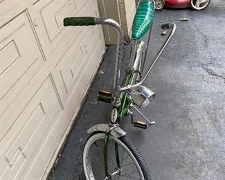 Schwinn #2. Vintage Stingray in Green with Banana Seat, Front Headlight, Chrome Fenders and Kick Stand.