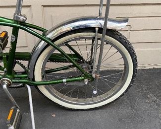 Schwinn #2. Vintage Stingray in Green with Banana Seat, Front Headlight, Chrome Fenders and Kick Stand.