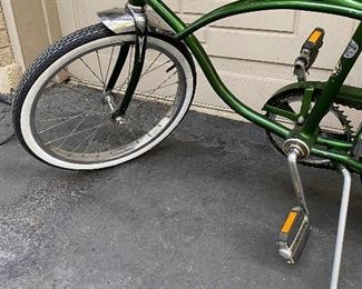 Schwinn #2. Vintage Stingray in Green with Banana Seat, Front Headlight, Chrome Fenders and Kick Stand.