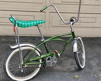 Schwinn #2. Vintage Stingray in Green with Banana Seat, Front Headlight, Chrome Fenders and Kick Stand.