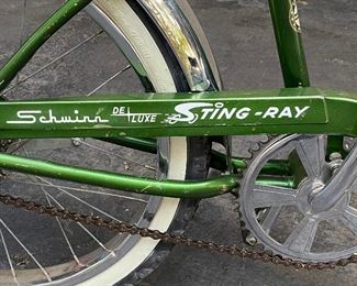 Schwinn #2. Vintage Stingray in Green with Banana Seat, Front Headlight, Chrome Fenders and Kick Stand.
