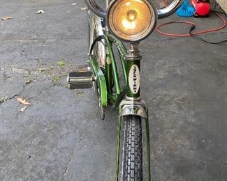 Schwinn #2. Vintage Stingray in Green with Banana Seat, Front Headlight, Chrome Fenders and Kick Stand.