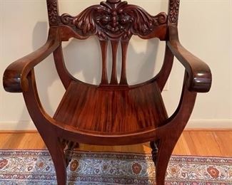 $400        NOW   150                                                                                                            STOMPS BERKHARDT COMPANY ROUNDED SEAT ANTIQUE CARVED FACE MASK-CARVED CHAIR
An antique North Wind chair made by Stomps Burkhardt Chair Company. Beautifully carved. Sturdy and useable. A beautiful and interesting piece of sculptural furniture to enhance any room.
DETAILS + DIMENSIONS:
24"W X 23"D X 34"H  
CONDITION: This is a vintage piece that has been very well cared for and is in very good sturdy condition.  Please refer to photo's for a more detailed look at condition.  We make every attempt to list and photograph any defects or signs of wear that are significant to this sale. 
LOCAL PICK UP BOYDS, MD. BUYER IS RESPONSIBLE FOR ANY NECESSARY DISASSEMBLY AND ALL COSTS ASSOCIATED WITH SHIPPING OR PICK UP.                             
