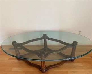 $200                                                                                                               ANTIQUE CARVED OPEN WOOD FRAME COFFEE TABLE WITH GLASS TOP
**  OFFERS CONSIDERED
WHY WE LOVE IT:
The richness of the hand carving and the elegance of the classic European style of this solid wood framed glass coffee table are unmistakable. The weight of the wood base is a great contrast the the open frame design giving it a lighter feel and a great choice for smaller rooms.
DETAILS + DIMENSIONS:
67"W X 32"D X 34"H
CONDITION: This piece is in very good condition.  It has been well cared for and only show minor signs of wear to be expected with use and age. Please refer to photo's for a more detailed look at condition.  We make every attempt to list and photograph any defects or signs of wear that are significant to this sale. 
LOCAL PICK UP BOYDS, MD.  BUYER IS RESPONSIBLE FOR ANY NECESSARY DISASSEMBLY AND ALL COSTS ASSOCIATED WITH SHIPPING OR PICK UP.  