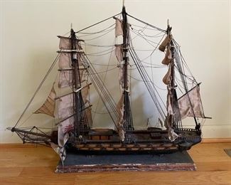 $50                                                                                                                   PAPER / WOOD SHIP MODEL FRAGATA ESPANOLA ANO 1780
A wooden Spanish “Fragata Española Año 1780” model sailing ship. This replica eighteenth century Spanish frigate is comprised of wood with canvas sails and applied detailing. The ship is presented on a wooden rectangular tapered stand with a gold tone plaque which reads “Fragata Española Año 1780”. 
DETAILS + DIMENSIONS:
32"W X 6"D X 25"H
CONDITION: This piece is in good condition. The piece shows wear and appears to have minor signs of age to some of the sails and rigging.  Please refer to photo's for a more detailed look at condition.  We make every attempt to list and photograph any defects or signs of wear that are significant to this sale. 
LOCAL PICK UP BOYDS, MD. (PIECE IS ON THE FIRST FLOOR WITH EASY ACCESS)  BUYER IS RESPONSIBLE FOR ANY NECESSARY DISASSEMBLY AND ALL COSTS ASSOCIATED WITH SHIP