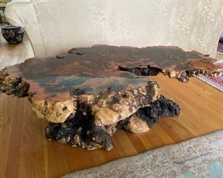 $1000                                                                                                               1960'S LIVE EDGE BURL WOOD EPOXY COFFEE TABLE
**OFFERS CONSIDERED
Statement piece! Bring this exquisite piece of the outdoors into your space as the focal art piece of the room. This table has a beautiful epoxy piano finish that shines and magnifies the composition of this live edge coffee table.  The wood and finish are in excellent condition.
DETAILS + DIMENSIONS:
50"L X 35"W X 15"H
CONDITION: This piece has been cherished and very well cared for. It is in very good condition. Please refer to photo's for a more detailed look at condition.  We make every attempt to list and photograph any defects or signs of wear that are significant to this sale. 
LOCAL PICK UP BOYDS, MD. (PIECE IS ON THE FIRST FLOOR WITH EASY ACCESS)  BUYER IS RESPONSIBLE FOR ANY NECESSARY DISASSEMBLY AND ALL COSTS ASSOCIATED WITH SHIPPING OR PICK UP.  THIS IS A VERY HEAVY PIECE, PLEASE B