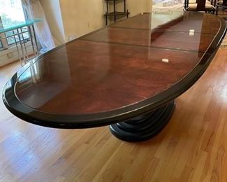 $ 750.00                                                                                                  HENREDON "SCENE THREE" BLACK LACQUER & BURLWOOD PEDESTAL DINING TABLE W/PAD & LEAF
OFFERS CONSIDERED
Chinoiserie-style burl and black lacquer dining set by Henredon of Morganton, NC, USA circa 1980. Oval table is composed of a burl inset surface framed by a black lacquer border raised on a double pedestal with brass accents atop a stepped base.  A luxurious piece in very good condition with minimal signs of wear.
THIS TABLE IS PART OF A 4-PIECE SET.  PLEASE SEND US A MESSAGE FOR MORE INFORMATION ON THE ADDITIONAL COMPANION PIECES.
DETAILS + DIMENSIONS:
99" Total length with leaf X 44"W X 29.5"H
CONDITION: This piece has been well cared for and is in extremely good condition. Please refer to photo's for a more detailed look at condition.  We make every attempt to list and photograph any defects or signs of wear that are significant to this sale. 
LOCAL PICK UP BOYDS, MD. 
