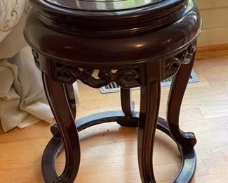 $150    NOW   $75.00                                                                                                                 CARVED ROSEWOOD TABLE SMALL ACCENT TABLE/ PLANT OR CANDLE STAND
OFFERS CONSIDERED
This beautiful wood stand, along with your favorite flowerpot or vase, will create an instant centerpiece in any room. Hand rubbed dark brown finish.
DETAILS + DIMENSIONS:
14"W X 14"D X 20"H
CONDITION: This piece has been well cared for and are in very good condition. Please refer to photo's for a more detailed look at condition.  We make every attempt to list and photograph any defects or signs of wear that are significant to this sale. 
LOCAL PICK UP BOYDS, MD. (PIECE IS ON THE FIRST FLOOR WITH EASY ACCESS)  BUYER IS RESPONSIBLE FOR ANY NECESSARY DISASSEMBLY AND ALL COSTS ASSOCIATED WITH SHIPPING OR PICK UP.         