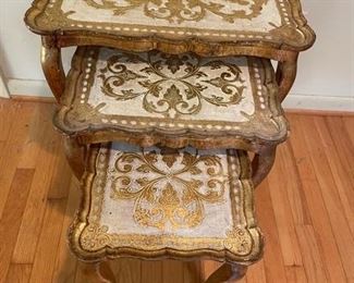 $150                                                                                                  SET OF THREE ITALIAN FLORENTINE HOLLYWOOD REGENCY WOOD NESTING TABLES
Mid century Florentine Renaissance style Italian nesting tables. Hand painted gold and ivory.  Fantastic set to add some glam to your room. Perfect for smaller spaces.
DETAILS + DIMENSIONS:
21W x 13D x 23H
16W x 13D x 20H
12W x 13D x 17H
CONDITION: Well cared for and in very good condition.  These tables have minor superficial signs of wear commensurate with age and use. Please refer to photo's for a more detailed look at condition.  We make every attempt to list and photograph any defects or signs of wear that are significant to this sale. 
LOCAL PICK UP BOYDS, MD. (PIECE IS ON THE FIRST FLOOR WITH EASY ACCESS)  BUYER IS RESPONSIBLE FOR ANY NECESSARY DISASSEMBLY AND ALL COSTS ASSOCIATED WITH SHIPPING OR PICK UP.         